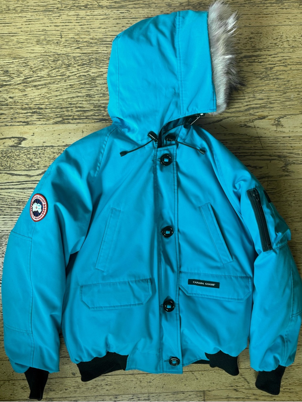 Canada Goose Turquoise Bomber Jacket with Black Lining and Logo Patch